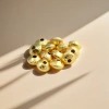 DIY handcrafted jewelry accessories with golden textured beads Application Scenario
